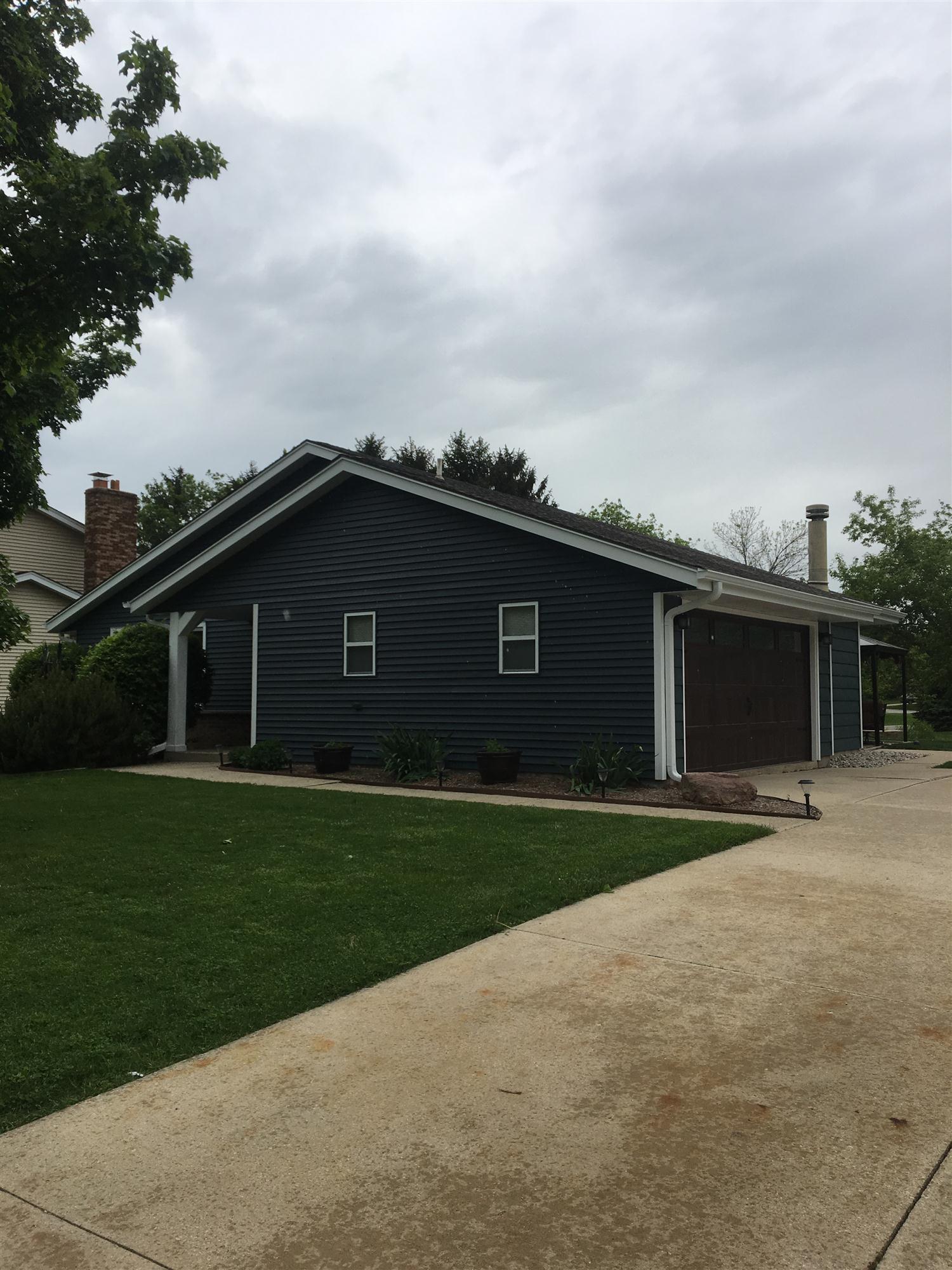 Home and garage exterior paint work Mequon garage painting services completed this exterior painting job