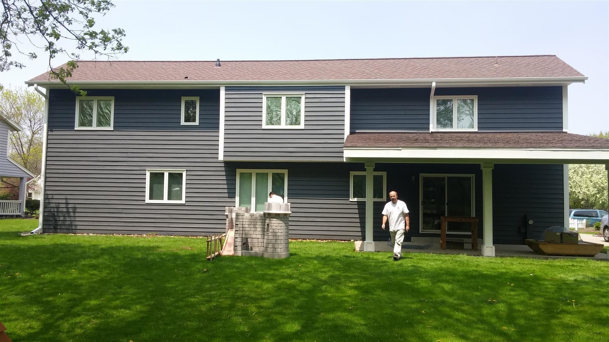 Cleaning up the backyard after the painting is finished Waukesha Painters & Painting contractors for residential spaces - Interior & Exterior Painting Services | Pressure Washing